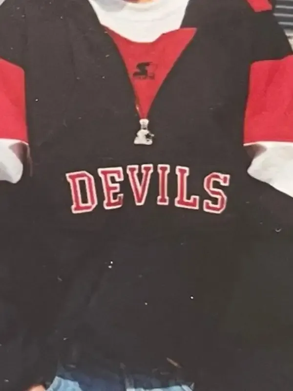 New Jersey Devils Sunny Mehta Starter Jacket in sleek black nylon with bold red and white accents, elastic cuffs and a relaxed hooded everyday pullover silhouette.