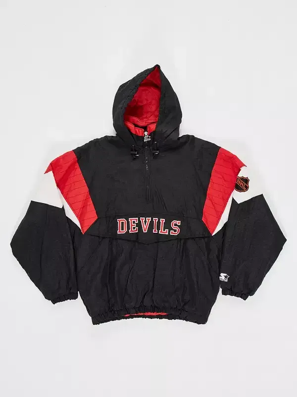 New Jersey Devils Sunny Mehta Starter Jacket front view in black nylon with bold red and white accents and a clean hooded half zip silhouette.