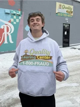 Quality Learning Center Hoodie highlighting professional fleece grain and luxury rib-knit cuffs.