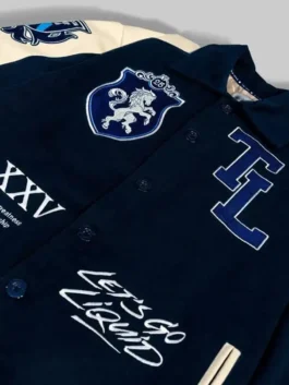 Team Liquid 2025 Letterman Jacket with bold embroidery in blue and white real leather and intricate Team Liquid 2025 esports detailing throughout.