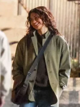 The Drama Zendaya Green Jacket highlighting professional pocket placement and luxury full length sleeves.
