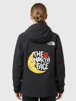 The North Face x Sky High Farm Rain Jacket featuring multiple pockets and professional button closure.