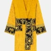 Yellow Versace Robe in professional finish with luxury side pockets and open hem cuffs.