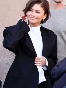 Rome Fashion 2026 Zendaya Black Blazer from Rome 2026 in rich black suiting fabric with a sharp wide notch lapel and Zendaya's polished street style silhouette.