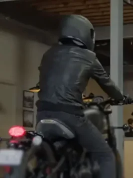 Back view of Benjamin Black Leather Jacket worn while riding a motorcycle in black leather style