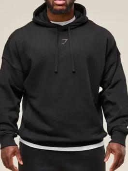 Close-up of a thick fleece-lined hoodie with long sleeves and a spacious front pocket.