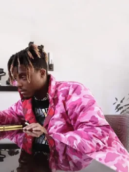 Side look of Juice Wrld Pink Camo Puffer Jacket with oversized puffer fit and camouflage pattern