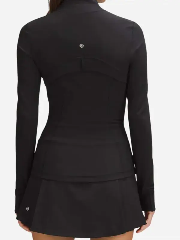 Back view of Women’s Define Cropped Black Gold Zipper Jacket with fitted athletic silhouette