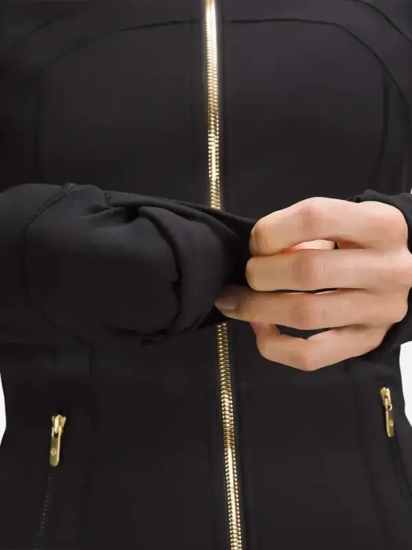 Women’s Define Cropped Black Gold Zipper Jacket with front zipper closure and fitted design