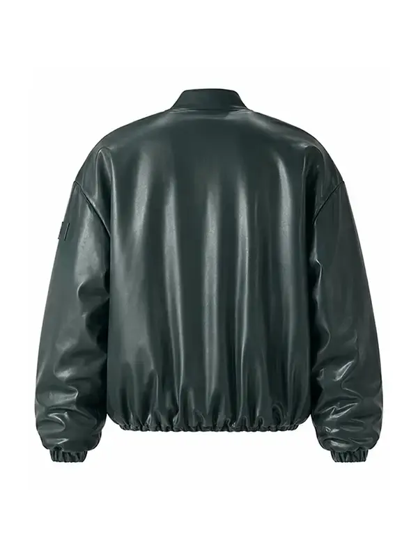 The back view of a minimalist dark green leather bomber jacket showcasing a clean paneled design with an elastic waist and cuffs.