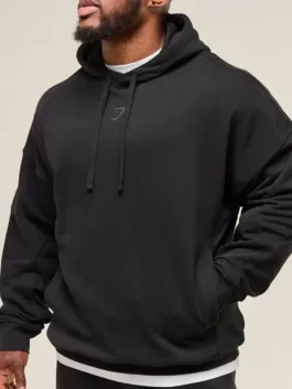 Stylish urban athletic hoodie for men with a minimalist front and detailed back design.