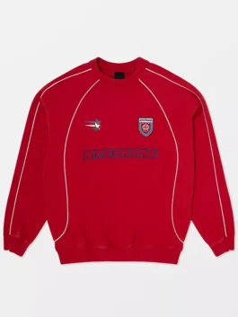 Saturday Night Live Marcello Hernandez Red Sweatshirt close-up showing neckline details