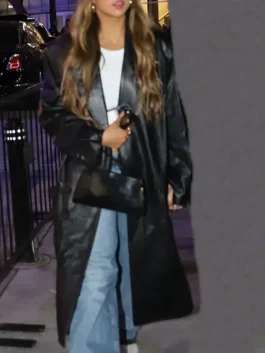 Tate McRae Black Leather Coat worn at Lakers game with oversized black leather styling and casual denim look