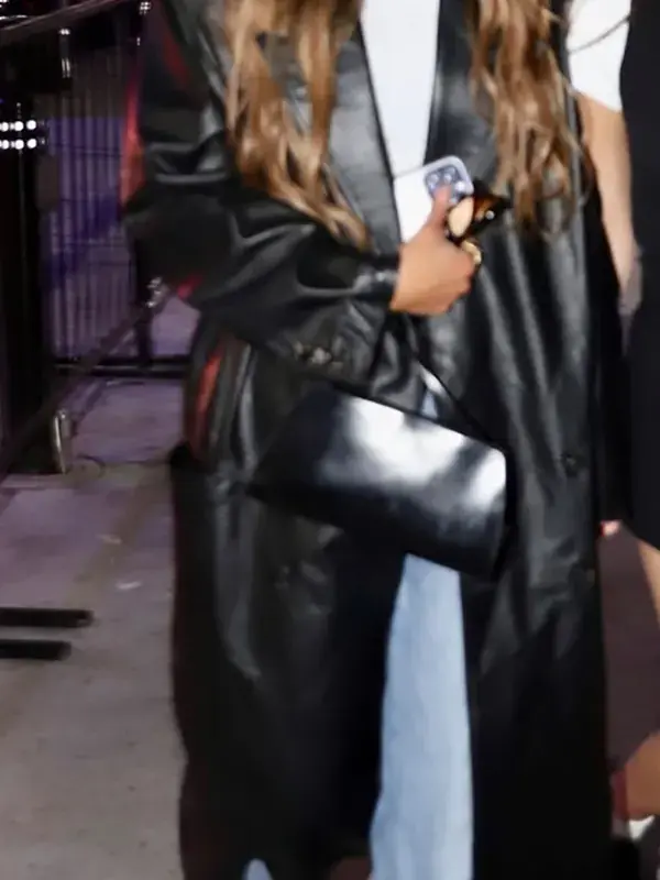 Tate McRae Black Leather Coat night look with long leather silhouette and oversized celebrity styling