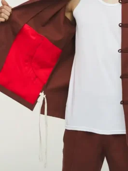 Adidas CLOT Track Jacket by Edison Chen highlighting professional waist pockets and luxury full length sleeves.