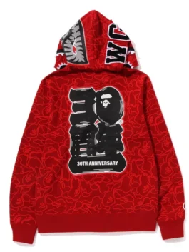 Bape 30th Anniversary Shark Camo Hoodie in bold red camo fleece with striking shark detailing and Bape's fearless 30th anniversary hooded zip-up streetwear energy.