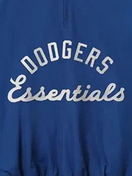 LA Dodgers Fear of God Essentials Half Zip Jacket in bold blue polyester with a rib knitted collar and the iconic Fear of God x LA Dodgers collab everyday build.