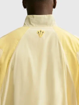 NOCTA Northstar Yellow Track Jacket back view highlighting professional color-blocking and luxury elastic hem.
