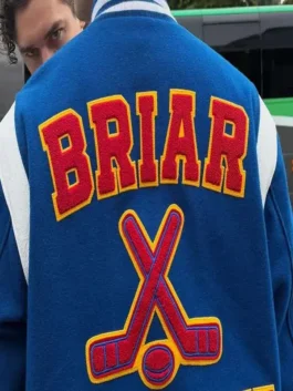 Off Campus Belmont Cameli Blue Varsity Jacket back view highlighting professional athletic stitching and luxury hem.