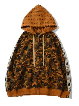 Unisex MCM Bape Hoodie in bold brown fleece with striking Bape printed design, rib knitted cuffs and the iconic MCM x Bape collab hooded everyday streetwear presence.