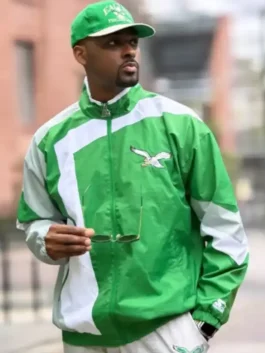 Vinny Graham HOMAGE x Starter Eagles Jacket in striking green and white parachute with a stand up collar and the bold HOMAGE x Starter Eagles collab everyday build.