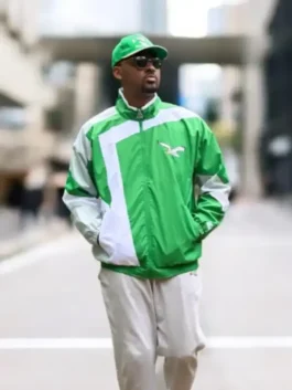 Vinny Graham HOMAGE x Starter Eagles Jacket front view in bold green and white parachute with a stand up collar and sharp HOMAGE x Starter Eagles everyday build.