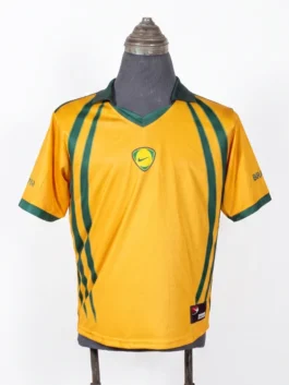 Full front view of the CJ X Nike Total 90 Retro Brasil Jersey on a display mannequin.