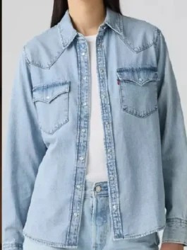 Front view of the blue Dutton Ranch Kelly Reilly Denim Shirt putting the full western ranch style of Kelly Reilly on bold display