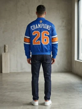 Kith Knicks 2026 Champions Satin Bomber Jacket in luxury blue satin featuring a professional rib knitted collar.