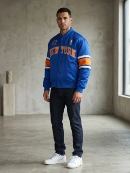 Kith Knicks 2026 Champions Satin Bomber Jacket featuring professional rib knitted cuffs and luxury viscose lining.