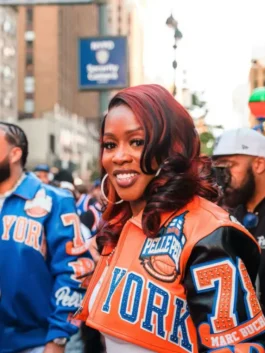Remy Ma Knicks Cropped Leather Jacket in professional real leather with a luxury orange and black finish.