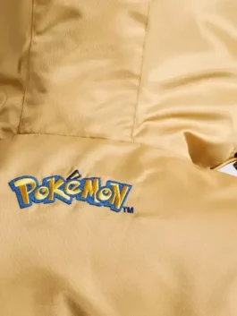 Pokemon Johto Region Starter Jacket featuring a professional half zipper closure and luxury gold colorway.