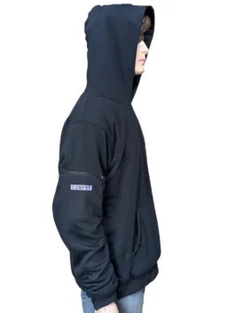 Side profile view of a mannequin wearing the dark navy blue Airplane Mode Travel Hoodie, displaying a small zippered sleeve pocket and a purple 