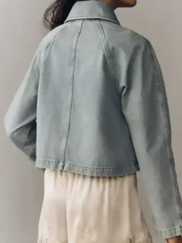 Back view of blue denim Battle On The Beach Sarah Baeumler Denim Jacket showing clean panel stitching.
