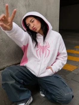 On-body view of white and pink fleece Spider Classic Full-Zip White And Pink Hoodie featuring a full zip front closure.
