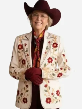 Front view of the white Dutton Ranch Beulah Jackson Floral Blazer worn by Annette Bening putting the full floral design on bold display