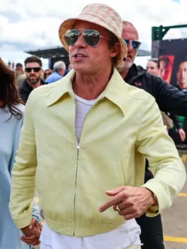 Front close-up shot of Brad Pitt wearing the light yellow corduroy jacket with a open front zipper, sharp classic collar, and aviator sunglasses.