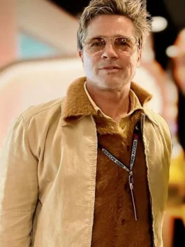 Close-up profile of Brad Pitt wearing the soft pale yellow cotton jacket showing the turn-down collar, front zipper stitching, and lightweight textured finish.
