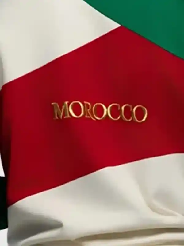 Get the fleece Morocco FIFA World Cup Colorblock Jacket featuring warm full sleeves and rib knitted cuffs.