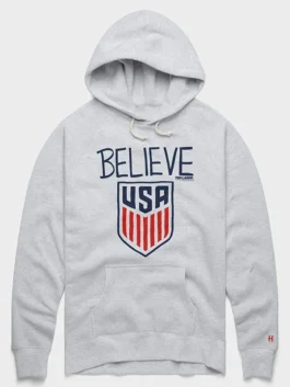 Front view of Homage Ted Lasso Believe x USA Crest Hoodie showcasing the hooded design and spacious kangaroo pocket.