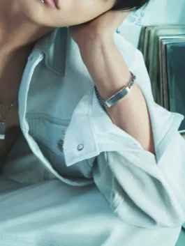 Rear view of the pristine white Jungkook White Denim Jacket showcasing clean stitching and an athletic drape.