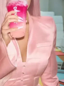 Pink satin Kylie Jenner Dunkin Donuts Pink Blazer featuring a clean stand up collar and elegant tailored design.