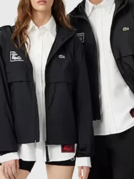 Sleek black Lacoste x Alpine Jacket crafted with durable polyester material and comfortable elastic cuffs.