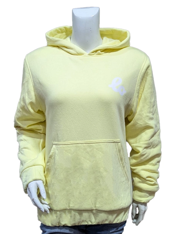 Front view of the pastel yellow Lola Winters pullover hoodie on a mannequin, showcasing the soft fleece fabric, a small white cursive logo on the left chest, a spacious front kangaroo pocket, and a cozy hood.