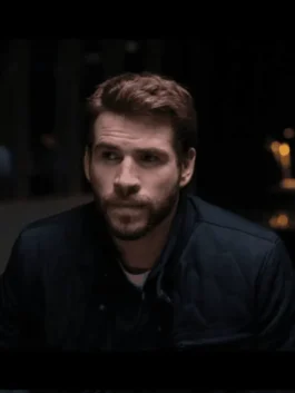 Full look of the navy blue Most Dangerous Game Liam Hemsworth Quilted Jacket with cozy rib knitted cuffs.