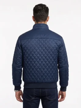 Back view of the navy blue Most Dangerous Game Liam Hemsworth Quilted Jacket showing clean quilted lines and panels.