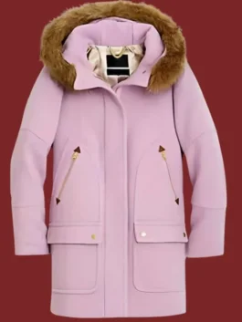 Front view product cut-out of the Jackie Howard light pink parka coat featuring a brown fur-trimmed hood and zipper pockets.