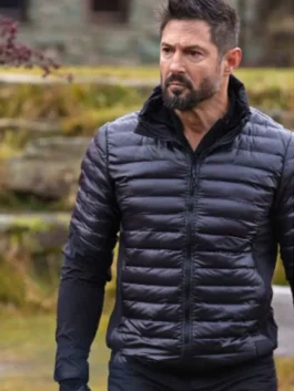 Rudy Reyes wearing a sleek black quilted puffer jacket with a high stand collar and zip closure in Special Forces World’s Toughest Test.