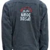 Rear view of the washed black Stranger Things denim jacket on a mannequin, showcasing the black sherpa collar and embroidered "Welcome to the Upside Down" text across the back.