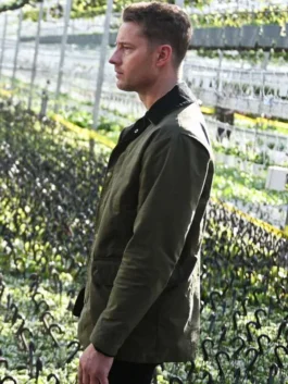 Side profile of Justin Hartley as Colter Shaw in Tracker S02 wearing an olive green cotton jacket with a dark corduroy collar.